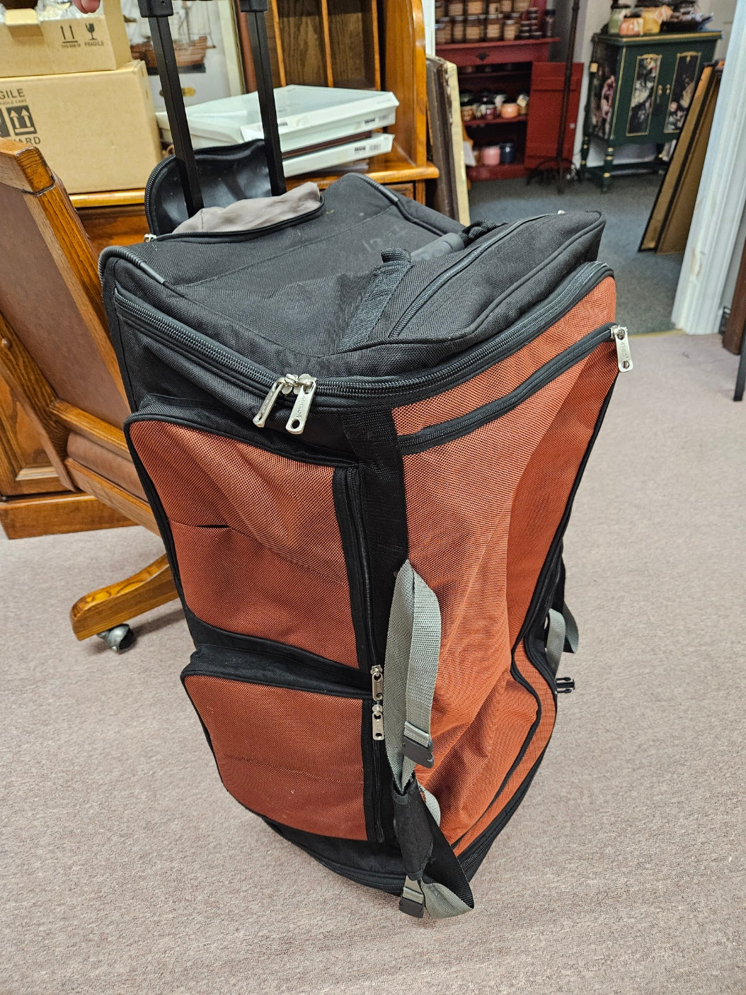 Large, Orange Rolling Duffle Bag